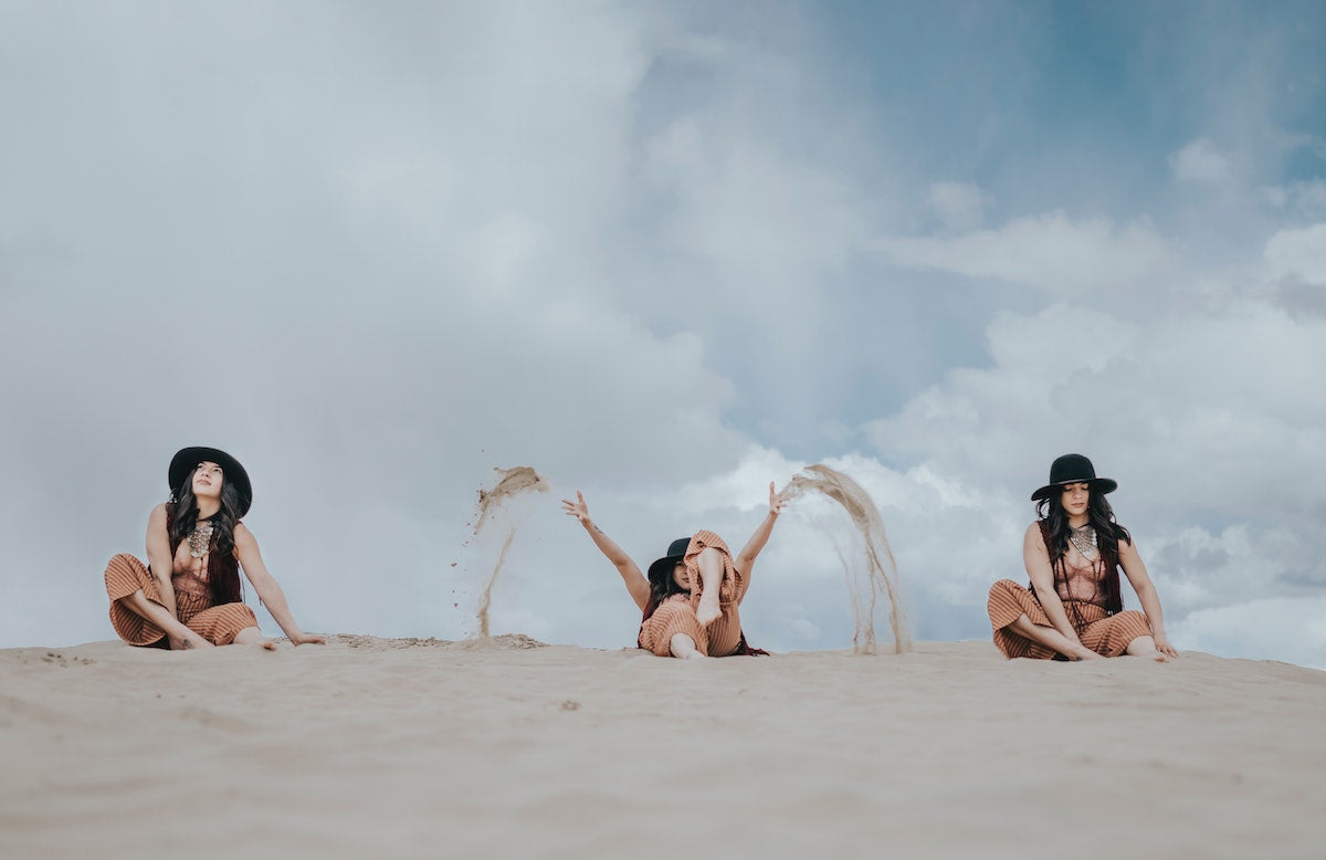 three images of the same women sitting in the sand