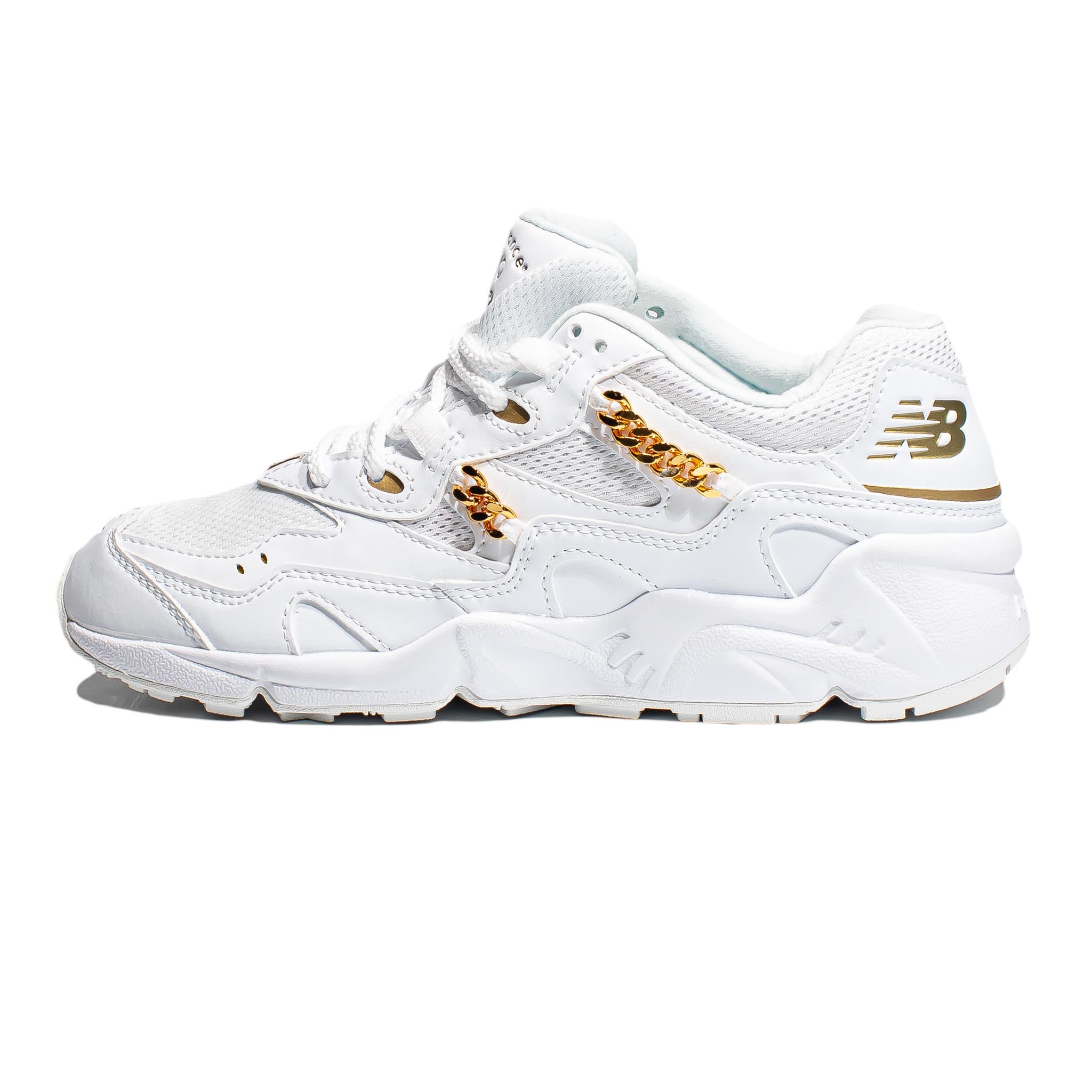 gold and white new balance