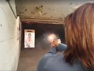 Lana Shadwick takes aim during practice at Shiloh Shooting Range in Houston.