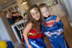 Superman and supergirl costumes