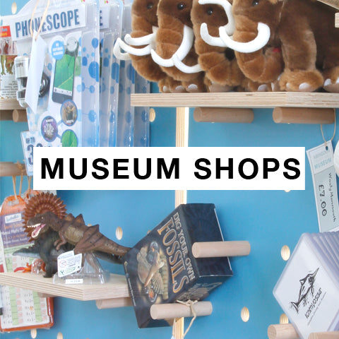 Museum Shops with bespoke painted pegboards for display merchandise by Kreisdesign