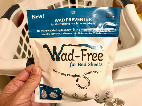 Wad-Free for Bed Sheets product package with white laundry basket