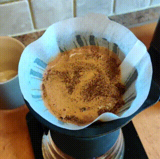 use a teaspoon to make sure all the ground coffee is wet