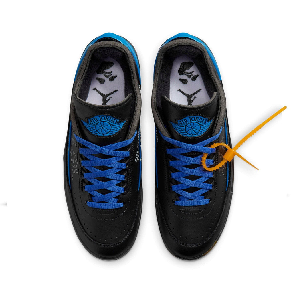 black and white jordans with blue tick