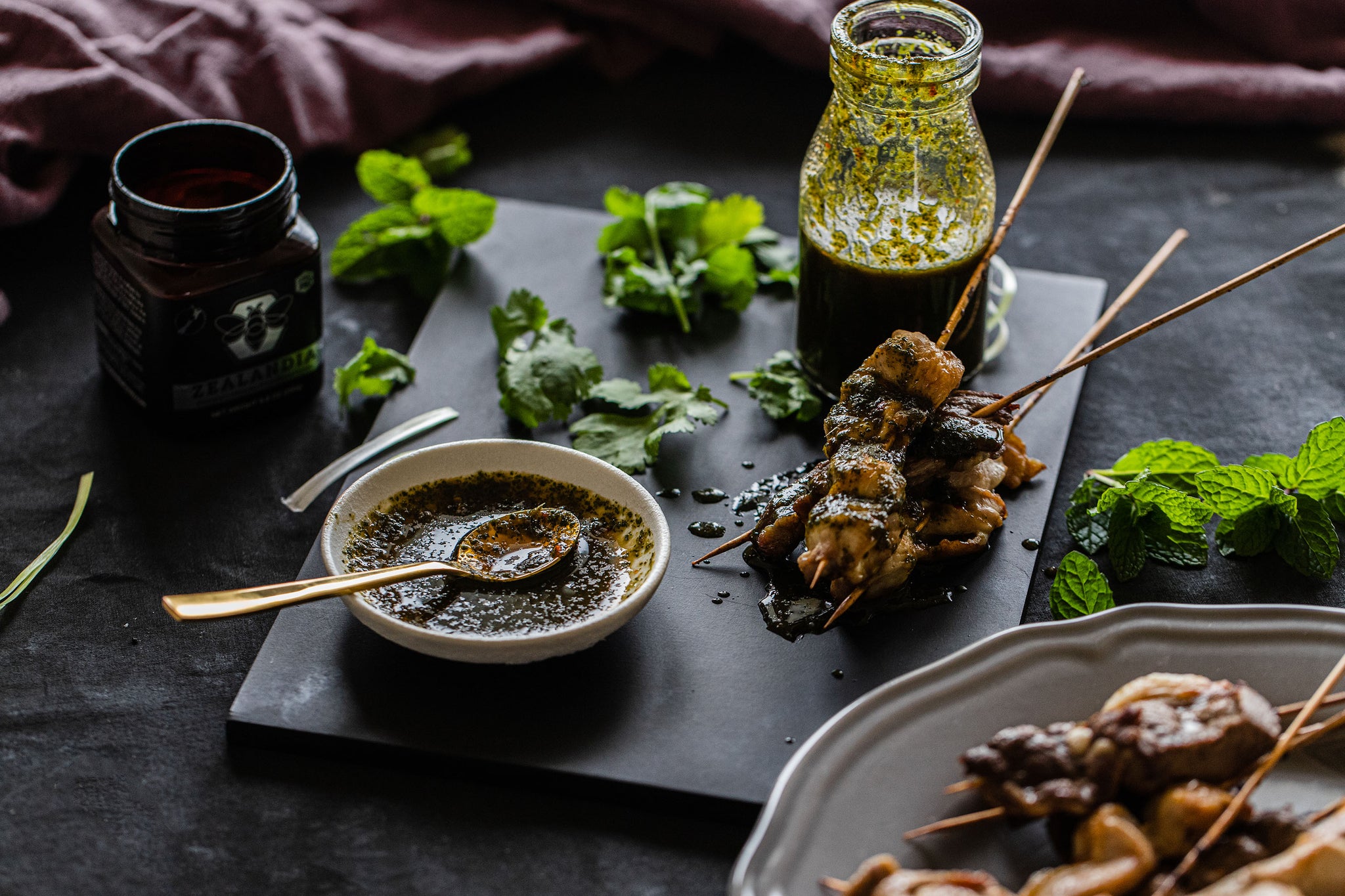 Manuka Honey with sate skewers