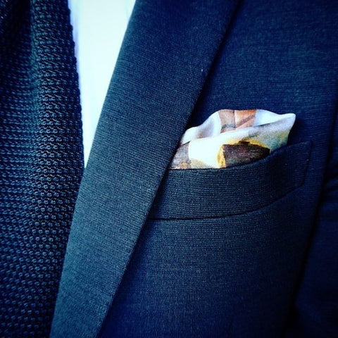 Navy jacket with pocket square