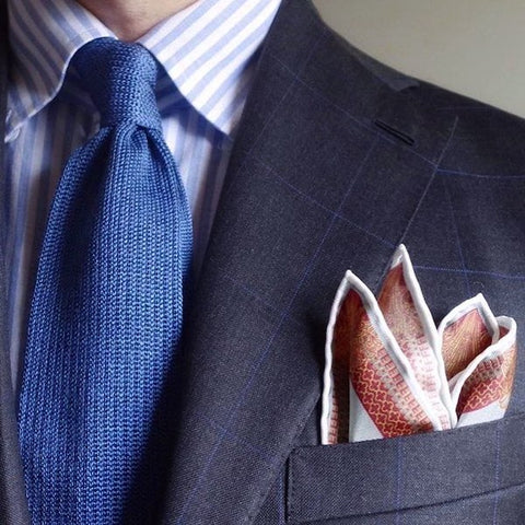 Pinstripe suit and pocket square