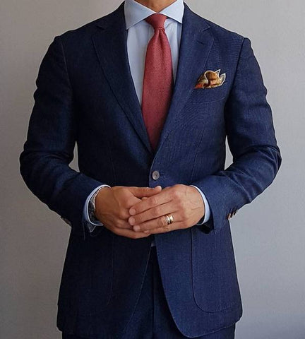 What colour pocket square with a navy suit