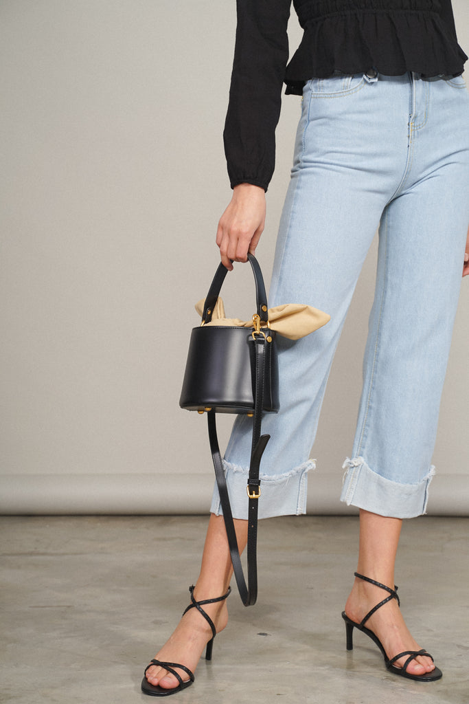 black faux leather bucket bag