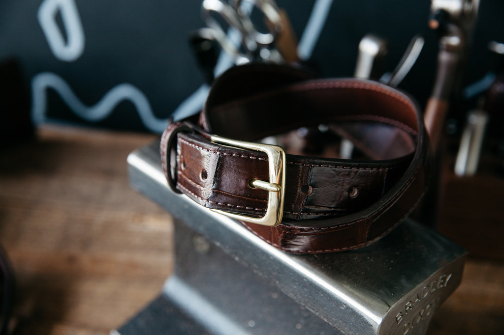 Handmade wild alligator leather belt in brown with brass buckle.
