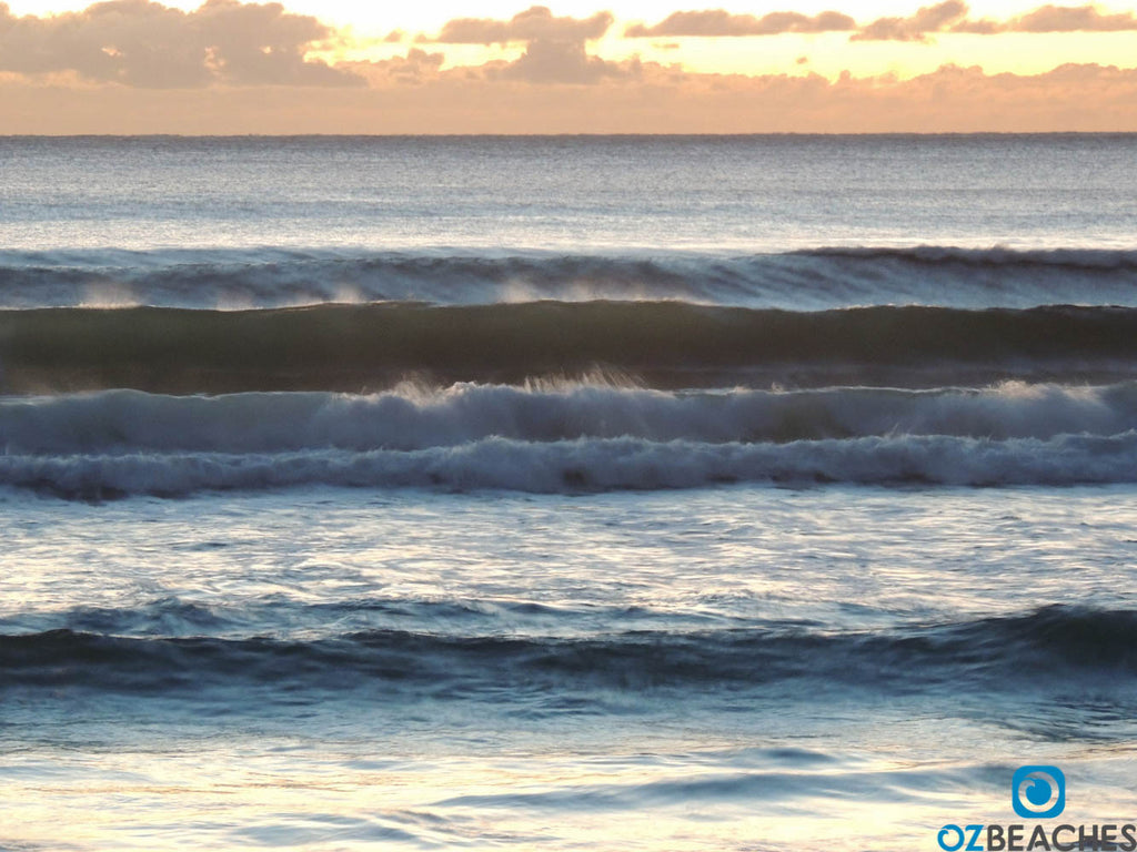 Early morning swell lines rolling into Manly Beach