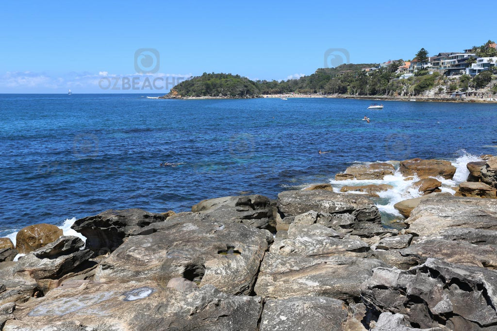 Cabbage Tree Bay is a popular place for boats and swimmers