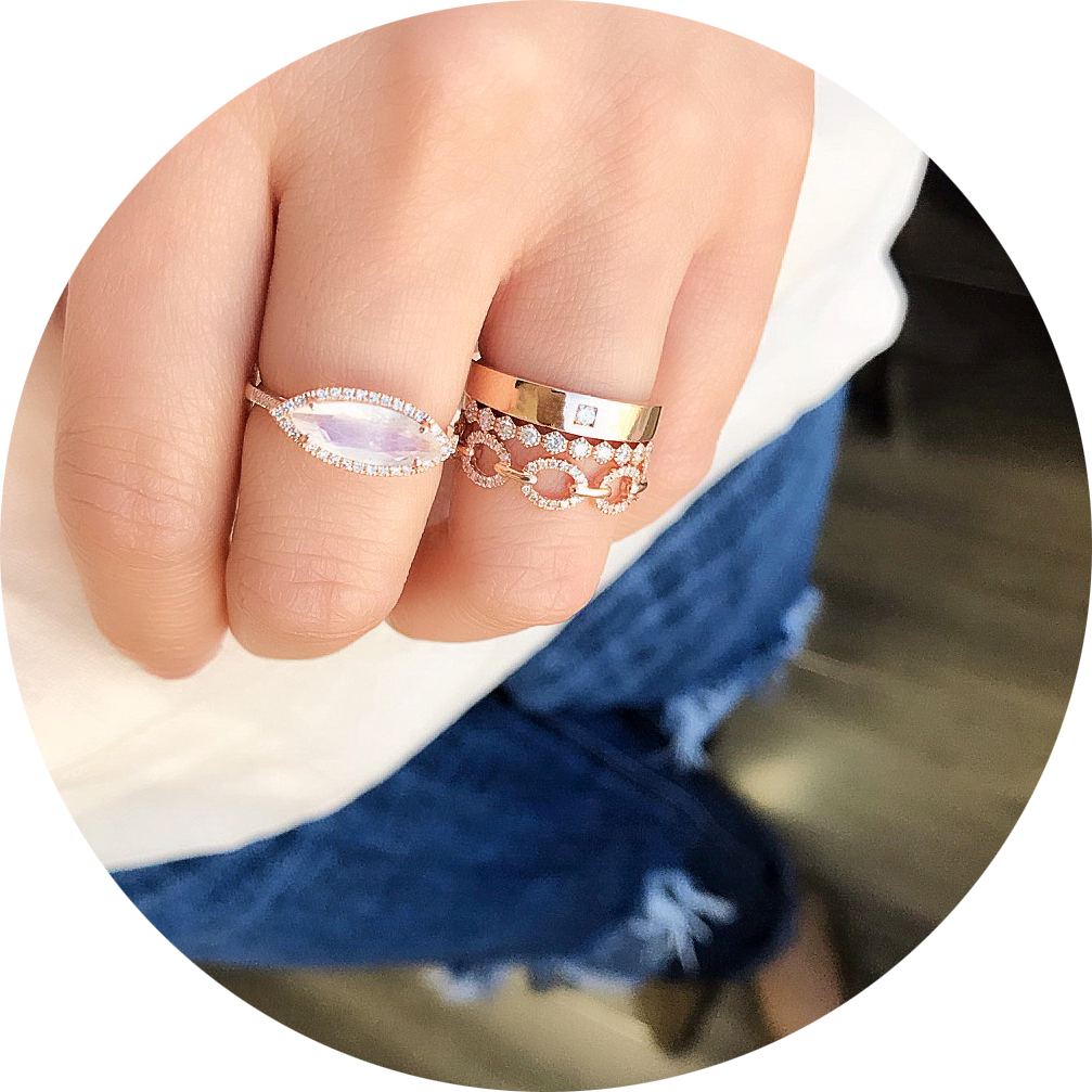 a selection of liven rings in stylish rose gold with colored stone accents