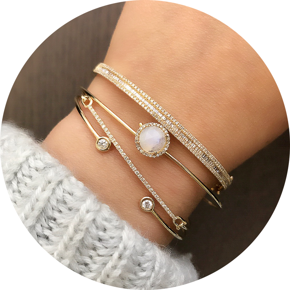 selection of bangles layered with the rainbow moonstone rosie hook bangle