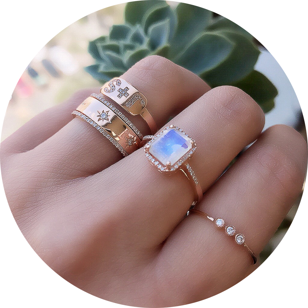rainbow moonstone ring shown with other liven rings