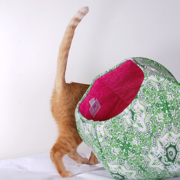 Watermelon Cat Ball cat bed made in a green kaleidoscope tile pattern with pink lining