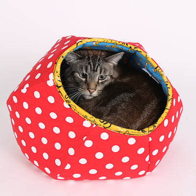 A 15 pound cat crammed inside a mini size Cat Ball® cat bed