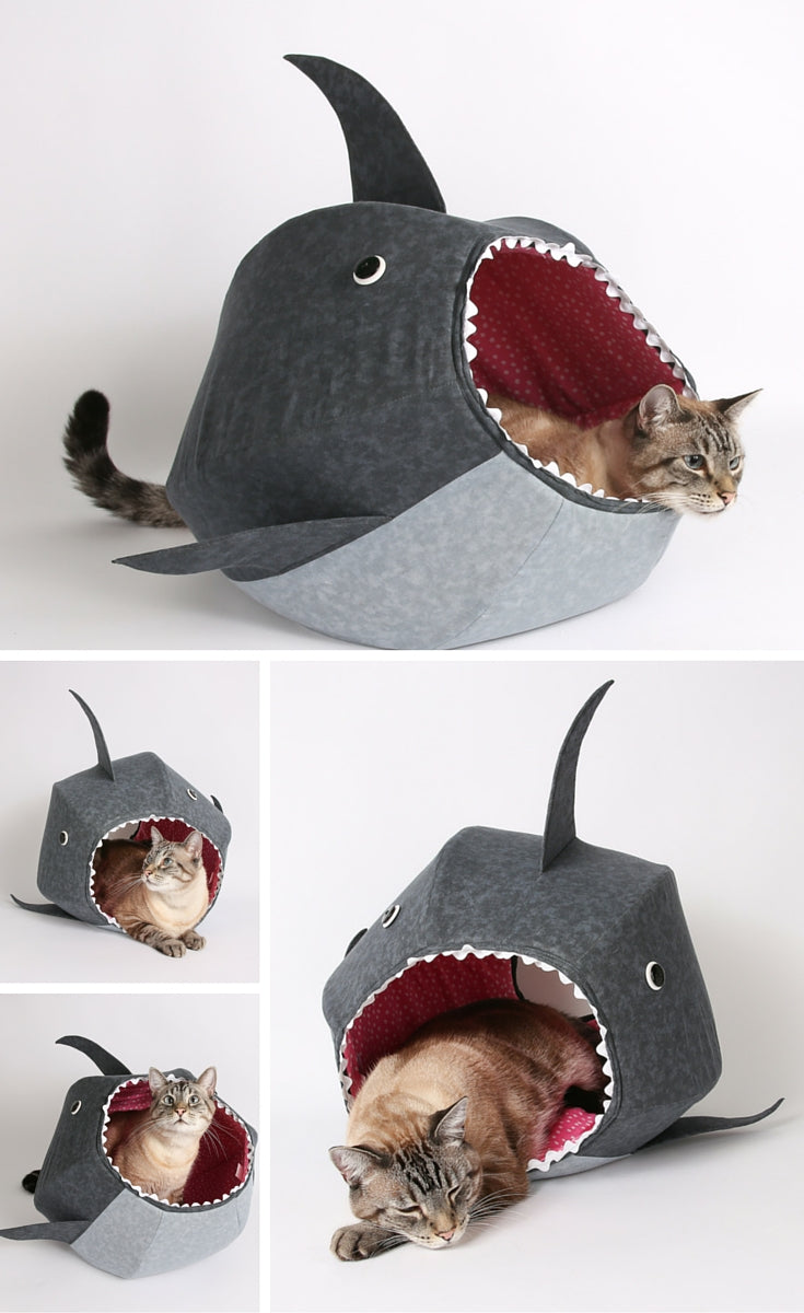 Feed your cat to the apex predator of the living room, the great white shark CAT BALL cat bed! This is a funny cat product design. 
