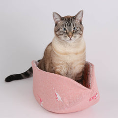the CAT CANOE cat bed is made by The Cat Ball, LLC