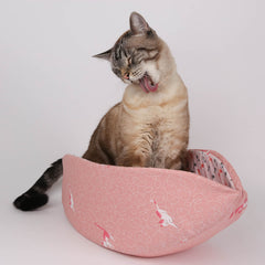the CAT CANOE cat bed is made by The Cat Ball, LLC