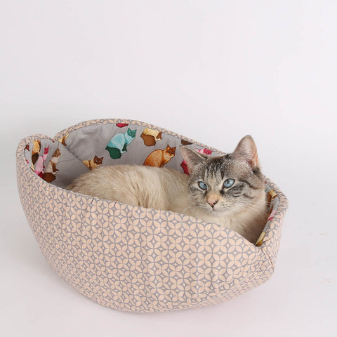 The Cat Canoe pet bed made with cute Rag Doll cat fabric