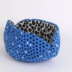 The CAT CANOE modern pet bed in royal blue and black polka dots