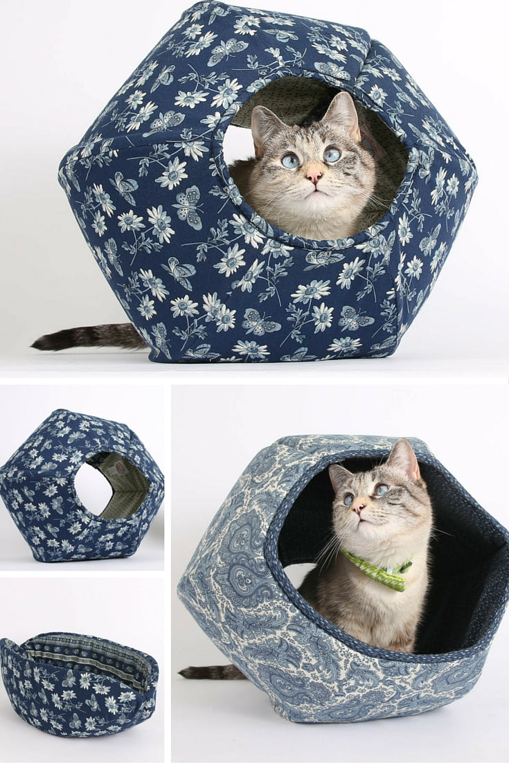 The Cat Ball and Cat Canoe are modern cat bed designs available in blue butterfly fabrics