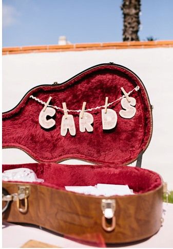 guitar case with wedding cards
