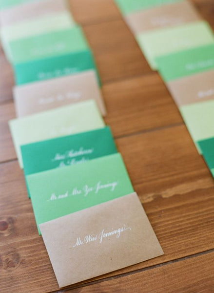 Using envelopes with name tags might just be the easiest way to make escort cards for your wedding.