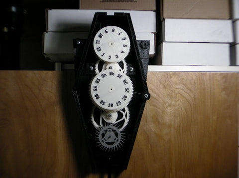 <strong>1st Place</strong> - Gravity Clock by <a href="http://www.reddit.com/user/rustedrobot" target="_blank">rustedrobot</a>. <strong><a href="http://fe2.net/projects/printableclock_v1/index.html" target="_blank">Source</a></strong>