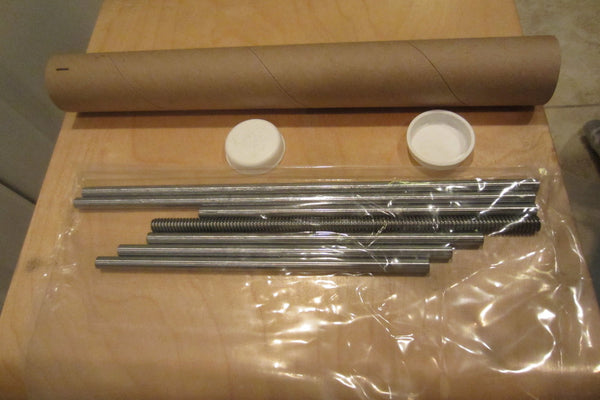  Linear rods and Z-screw.  I wish the Z-screw was bagged separately; but they were definitely protected from the rest of the contents in the shipping box.