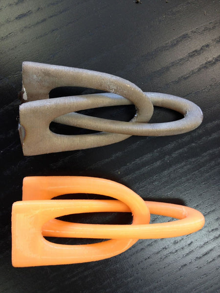 Mobius strips lost-PLA casting in bronze. By ArtBronze.  Courtesy of Deezmaker