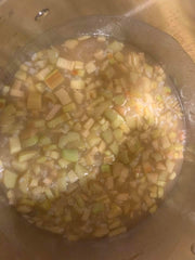 Rhubarb and rice boiling.
