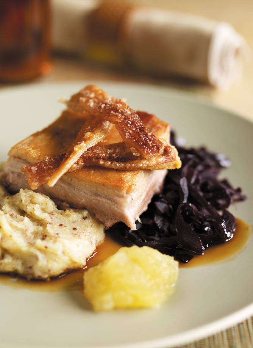 roast belly pork with mustard mash and braised red cabbage