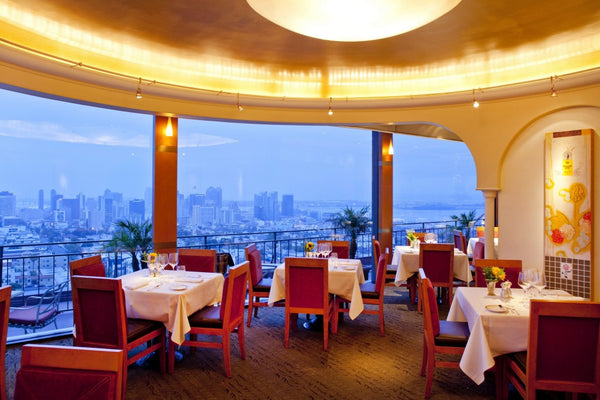 Restaurant with city skyline view 