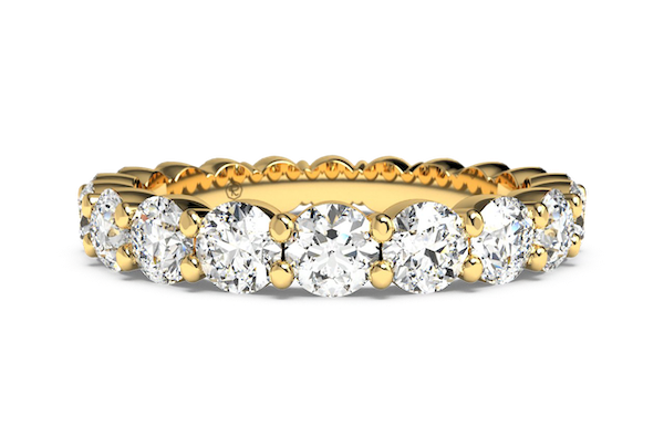 yellow gold shared prong eternity ring
