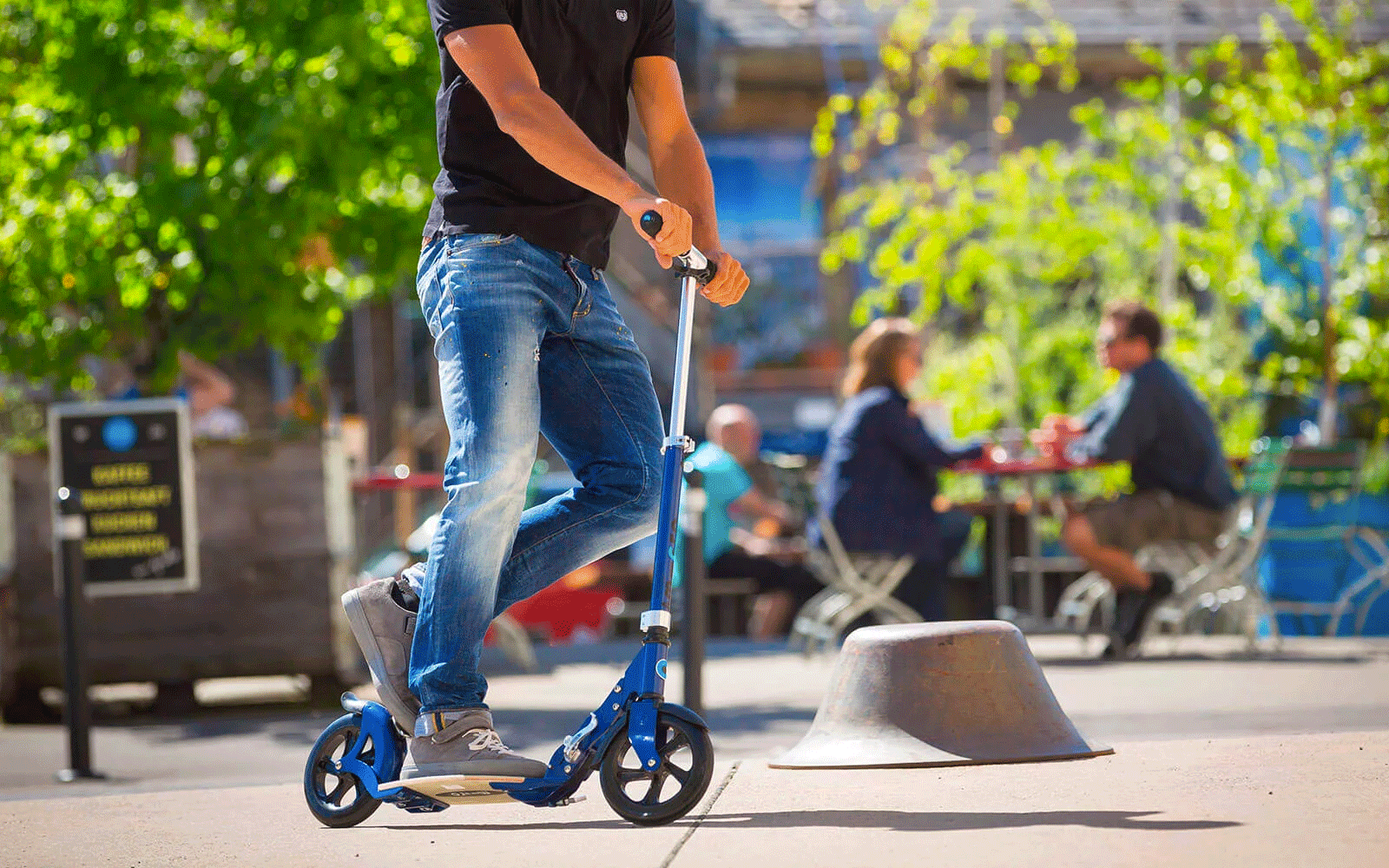 micro flex deluxe blue 200mm kick scooter with male rider