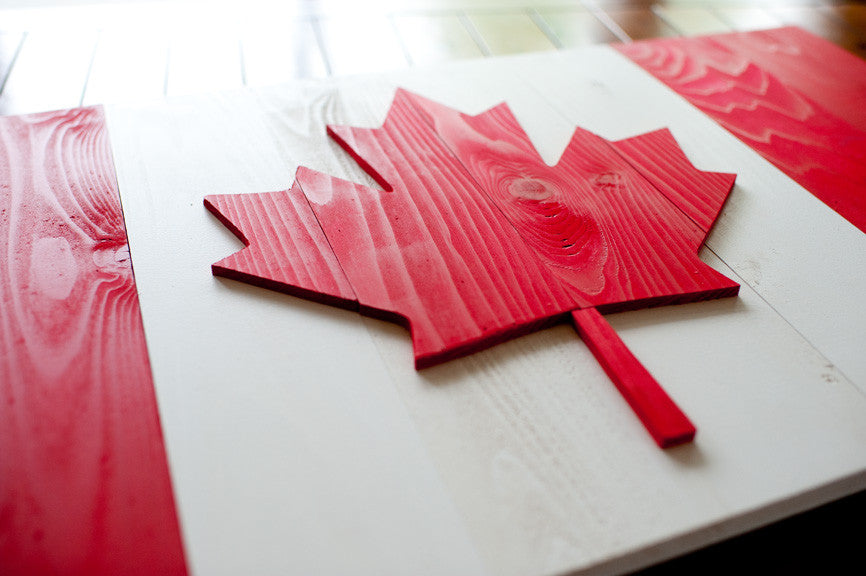 Details of the wooden replica of the Maple Leaf flag