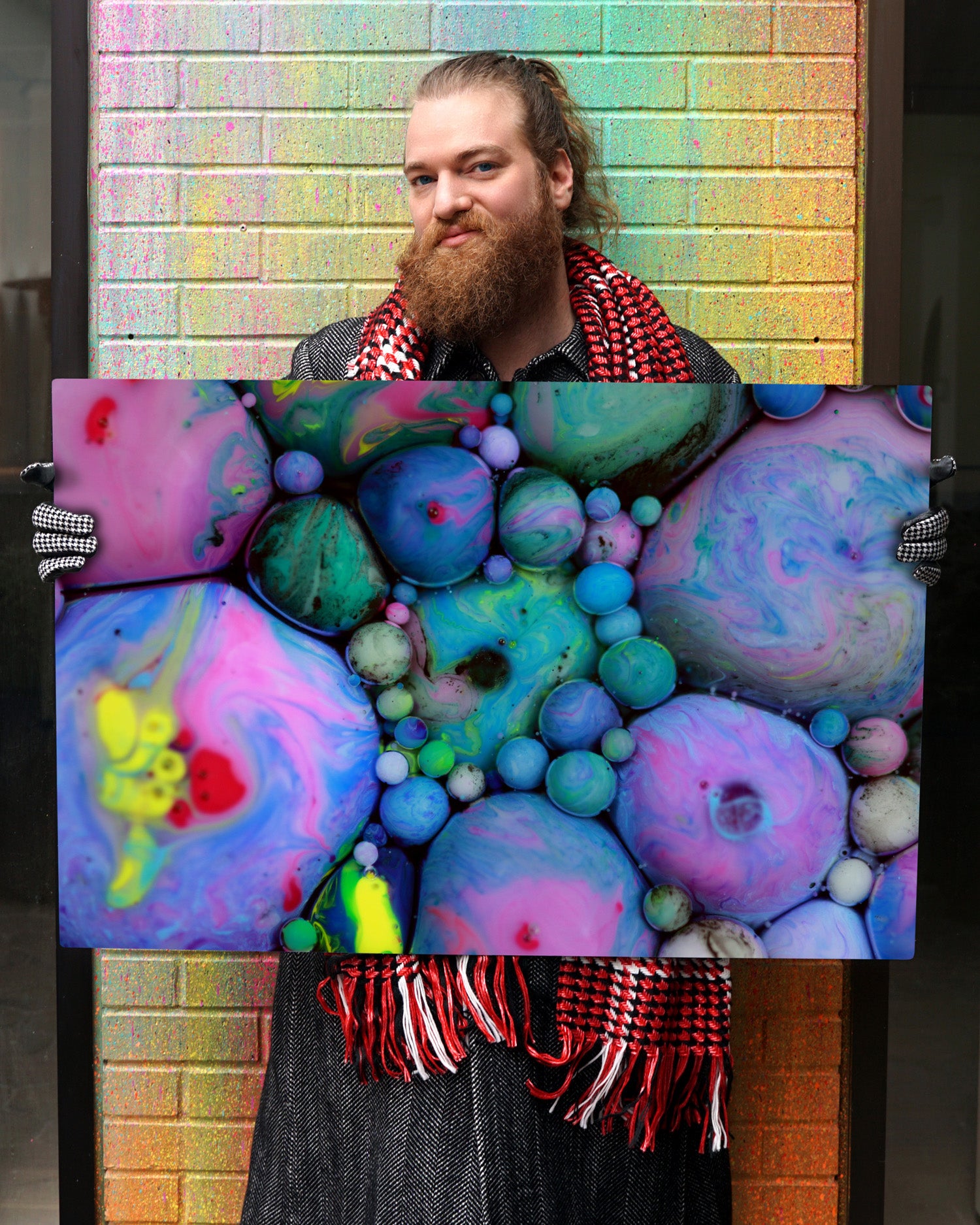 Seb Duke, "The Big in the Small", holding art photo, "The Truth Emerges"
