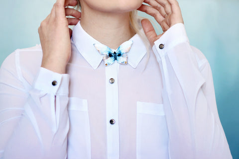 Butterfly Brooch worn as a bow-tie on a white shirt.