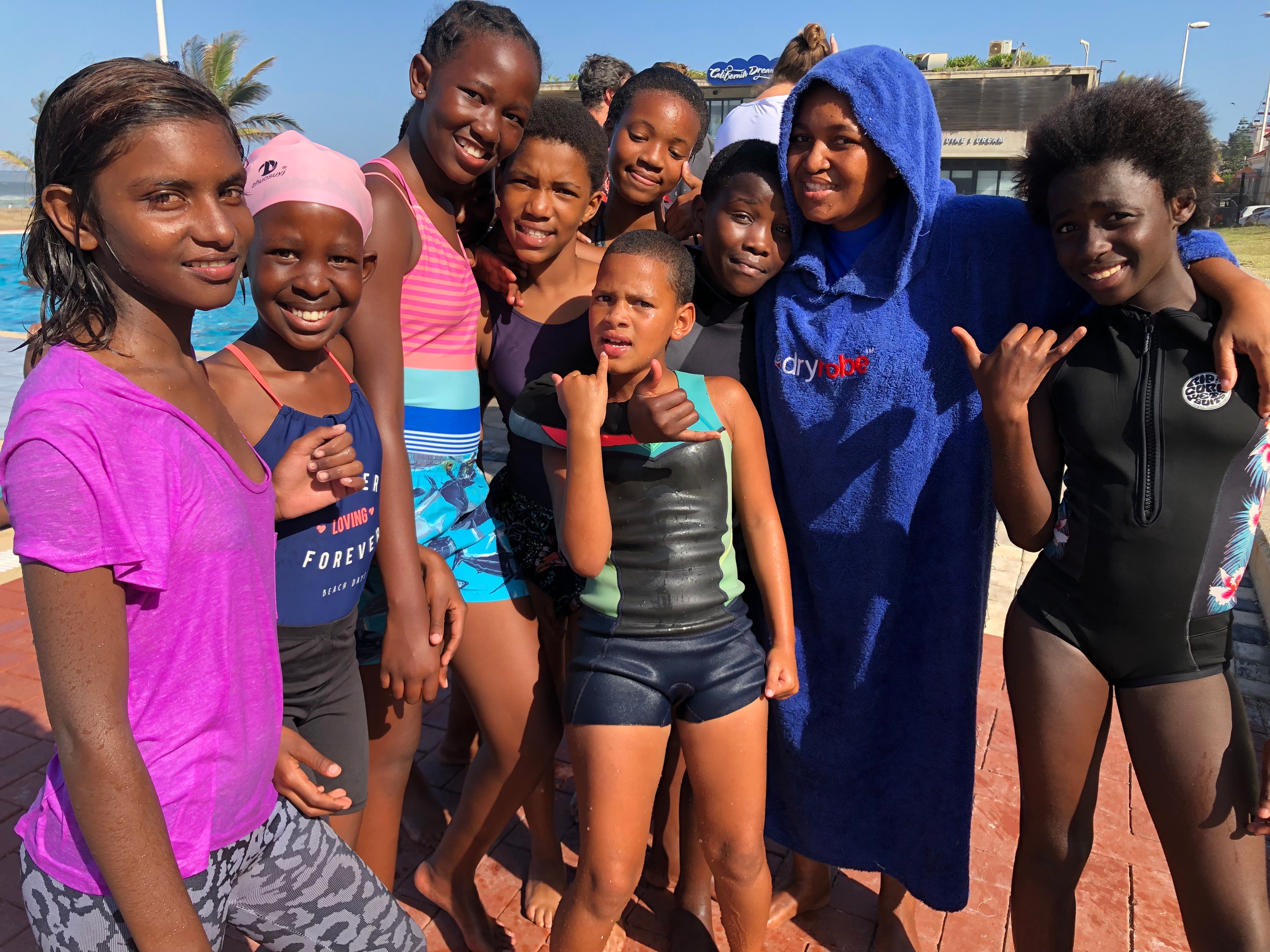 Girls hanging out at the swimming pool - Surfers Not Street Children