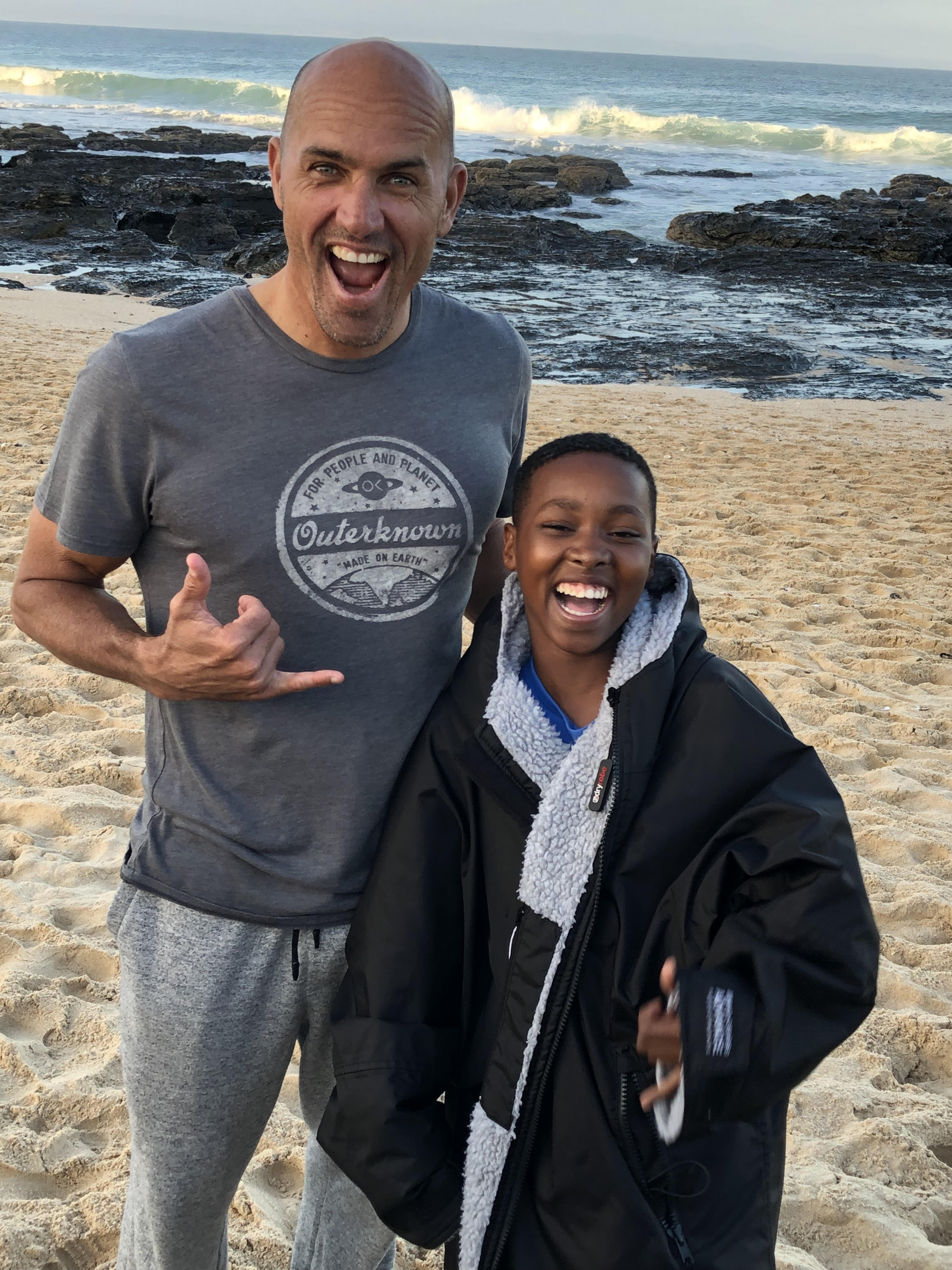 Kelly Slater with Surfers Not Street Children at WSL J-Bay Open 2019