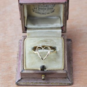 The small gold heart ring in gold would make the perfect gift for her