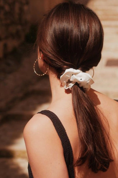 low ponytail hair scrunchies hairstyle