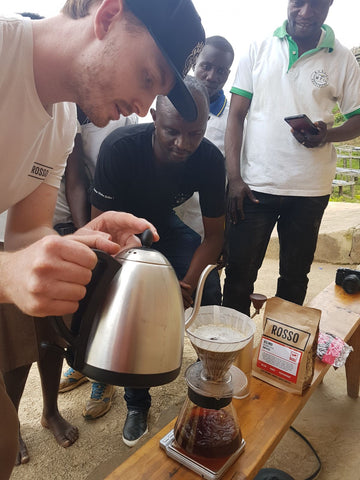 Cole Torode brewing Kilimbi roasted coffee beans for workers at Kilimbi Station