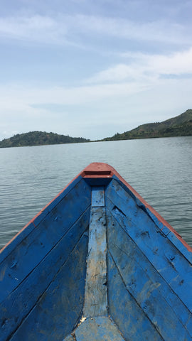 Taking a boat on Lake Kivu to Gisheke Station