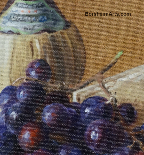 Detail of painted grapes with Italian bottle of Chianti wine