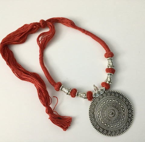 oxidized pendant in ethnic thread