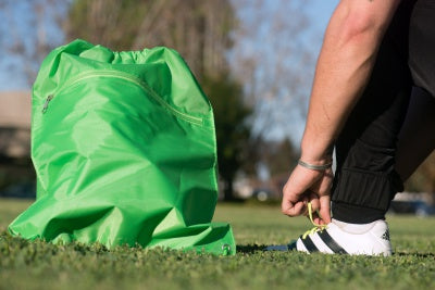 green drawstring backpack