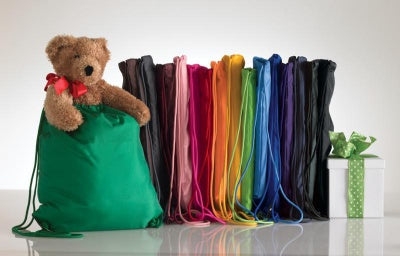 drawstring backpacks in multiple colors and teddy bear